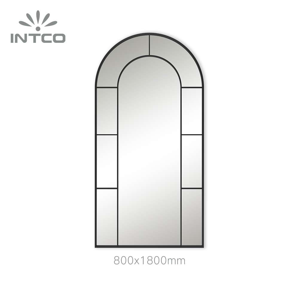 Black metal wall mirror with arched window pane frame